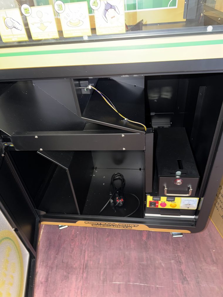 Where it is. Sensor sits on the angled panel, top-left of the open cabinet.