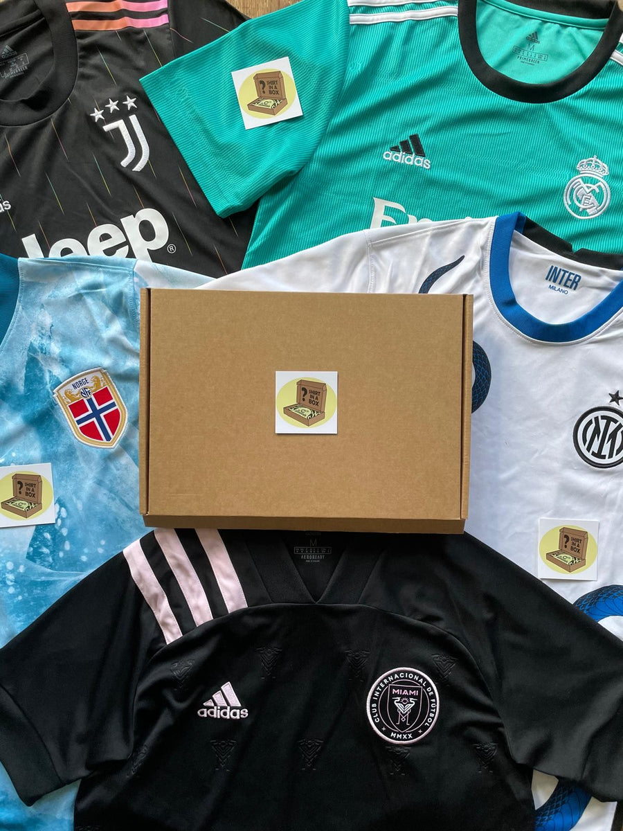 Authentic football shirts arranged around a Shirt in a Box mailer
